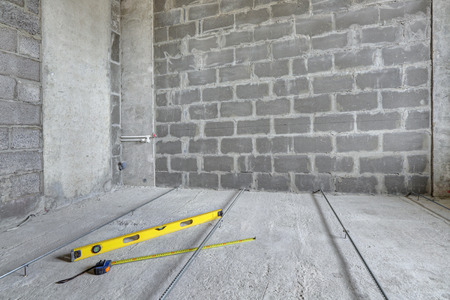 Floor repair, installing a screed guide for concrete screedsの写真素材