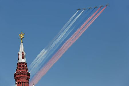 MOSCOW, RUSSIA - MAY 07, 2019: Rehearsal of the Victory Day celebration (WWII). The airshow on the Red Square, group of assault plane Sukhoi Su-25 Grach (NATO reporting name: "Frogfoot") in the sky smoke colors of the Russian flagのeditorial素材