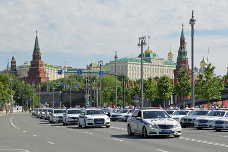 MOSCOW, RUSSIA - JUN 24, 2020: Police cars on the Prechistenskaya embankment in the center of Moscow during the parade in honor of the 75th anniversary of Victory in the Great Patriotic Warのeditorial素材