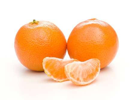 Orange mandarin or tangerine fruit isolated on white backgroundの写真素材