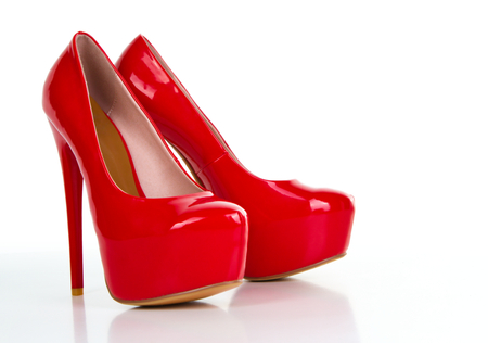 Red high heel women shoe isolated on white backgroundの写真素材