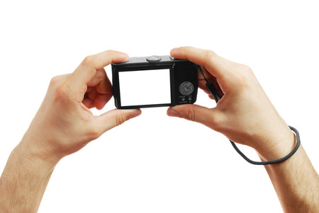  The digital camera in a hand
