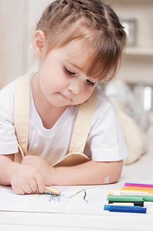 Little girl artist paints in studioの写真素材