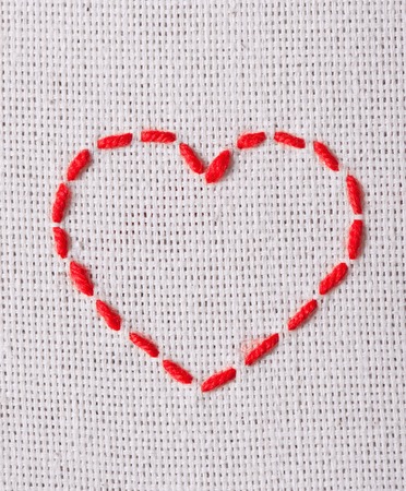 Embroidered symbols on a fabricの写真素材