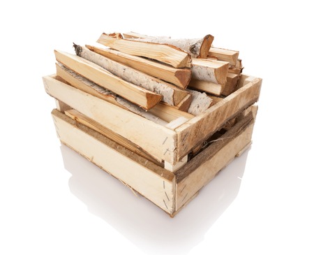 The logs of fire wood isolated on whiteの写真素材