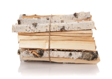 The logs of fire wood isolated on whiteの写真素材