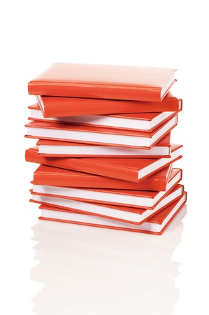 Heap of books on a white backgroundの写真素材