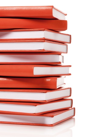 Heap of books on a white backgroundの写真素材