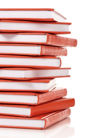Heap of books on a white backgroundの写真素材