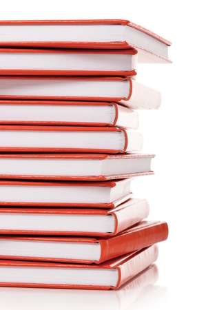 Heap of books on a white backgroundの写真素材