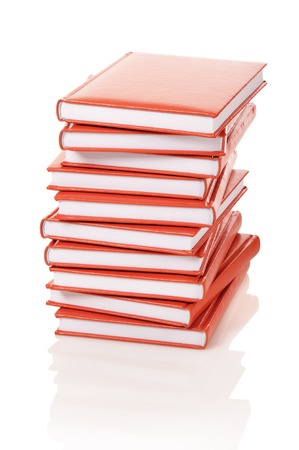 Heap of books on a white backgroundの写真素材