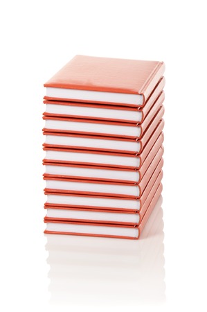 Heap of books on a white backgroundの写真素材