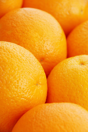 Background from ripe large orangesの写真素材