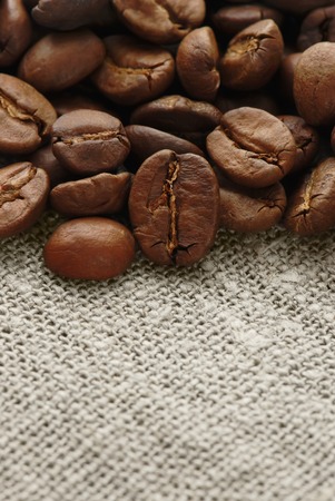 Coffee beans on a hessianの写真素材