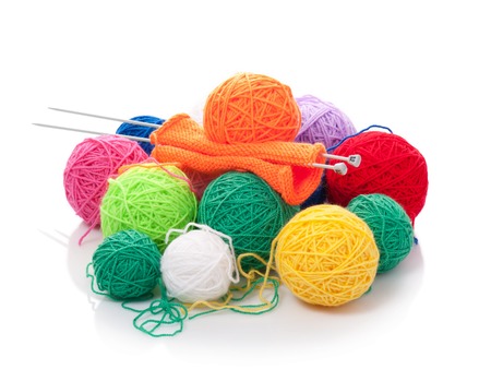 Color woolen clews for knitting on a white backgroundの写真素材
