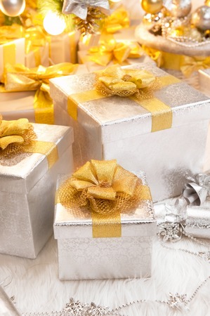 Boxes of presents under the Christmas treeの写真素材
