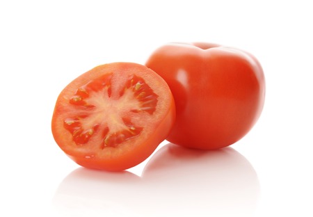 The red tomato isolated on whiteの写真素材