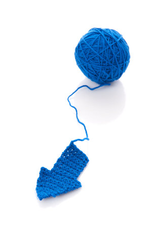Color woolen clews for knitting on a white background