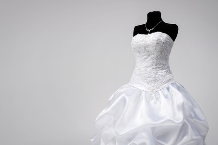 Beautiful snow-white bridal dress on a mannequinの写真素材