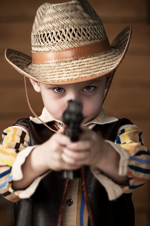 Portrait of a boy in a cowboy decorの写真素材