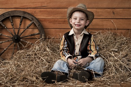 Portrait of a boy in a cowboy decorの写真素材