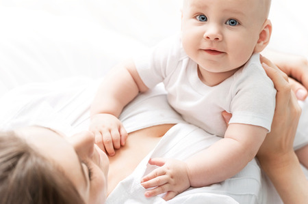 Portrait of happy mother and babyの写真素材