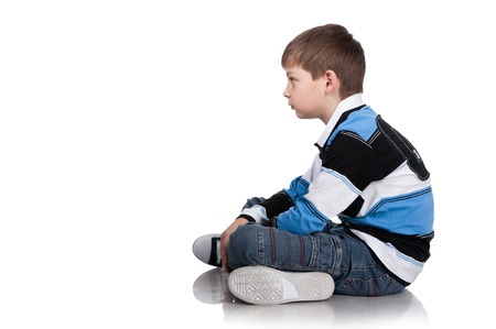Portrait of the boy on a white backgroundの写真素材