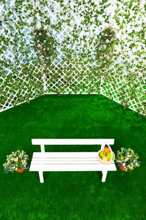 Bench with an arbor in the garden in summer sunny dayの写真素材