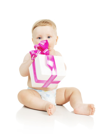 The small child with a gift in the hands, isolated on whiteの写真素材