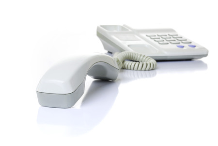 Tube from the phone with a cable on a white backgroundの写真素材