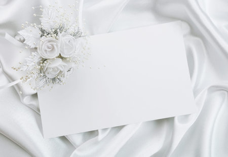 The wedding invitation with a bouquet of the bride on a white backgroundの写真素材