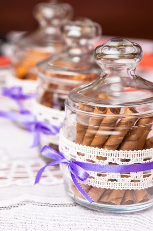 Decorated cookies in a glass containerの写真素材