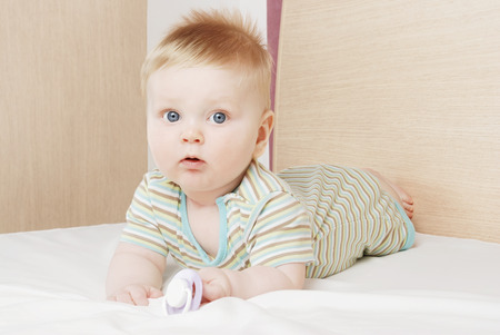 The boy with concentration somewhere looksの写真素材