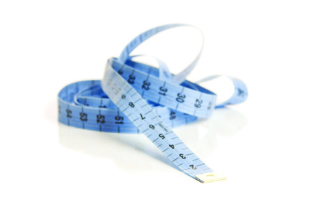 Measuring tape on a white backgroundの写真素材