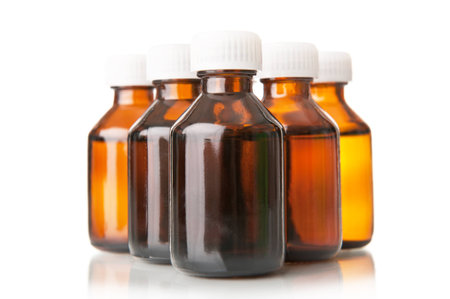 Medical bottles isolated on whiteの写真素材