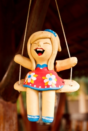 cheerful of a child with the swingの写真素材