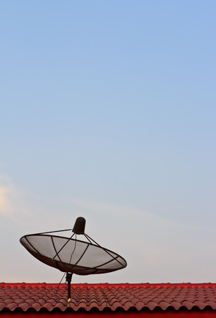 satellite on the red roofの写真素材