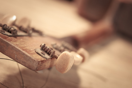 vintage style with old wood guitarの写真素材