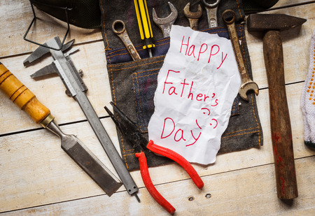 father day paper card with tool  from kid on woodの写真素材