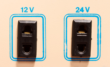 black socket connection electric on white wallの写真素材