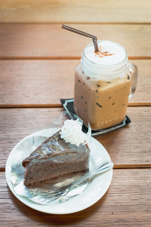 ice coffee cup on woodの写真素材