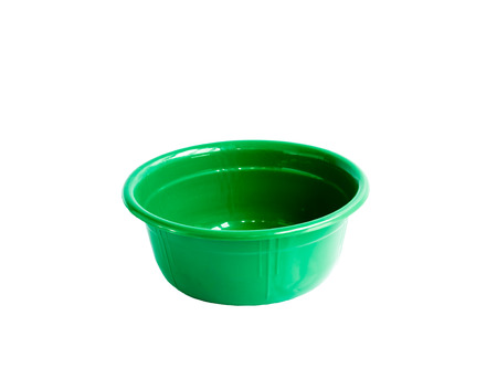green plastic basin on isolated backgroundの写真素材