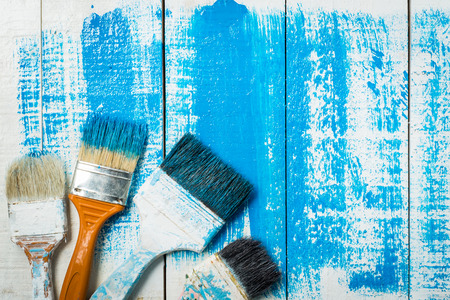 painting brush tool  on woodの写真素材