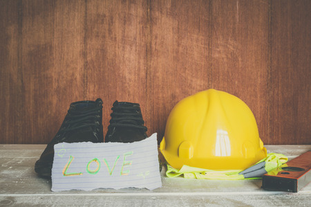 still life dress with paper sign love on woodの写真素材