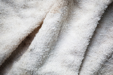closeup dirty white fabric crease textureの写真素材