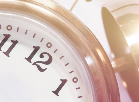closeup old alarm clock with retro color style