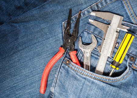 tool kit in jean pocket backgroundの写真素材