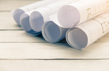 Roll blueprint paper construction planning concept on tableの写真素材