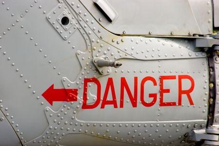 Danger sign painted on the side of an aircraft.の写真素材