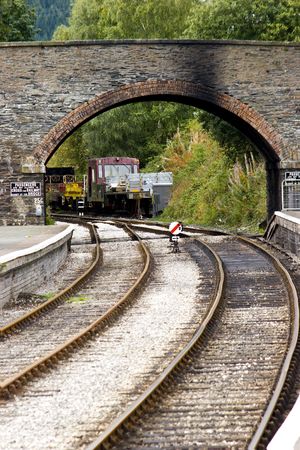 A bridge over the tracks of a preserved Vctorian railwayの写真素材